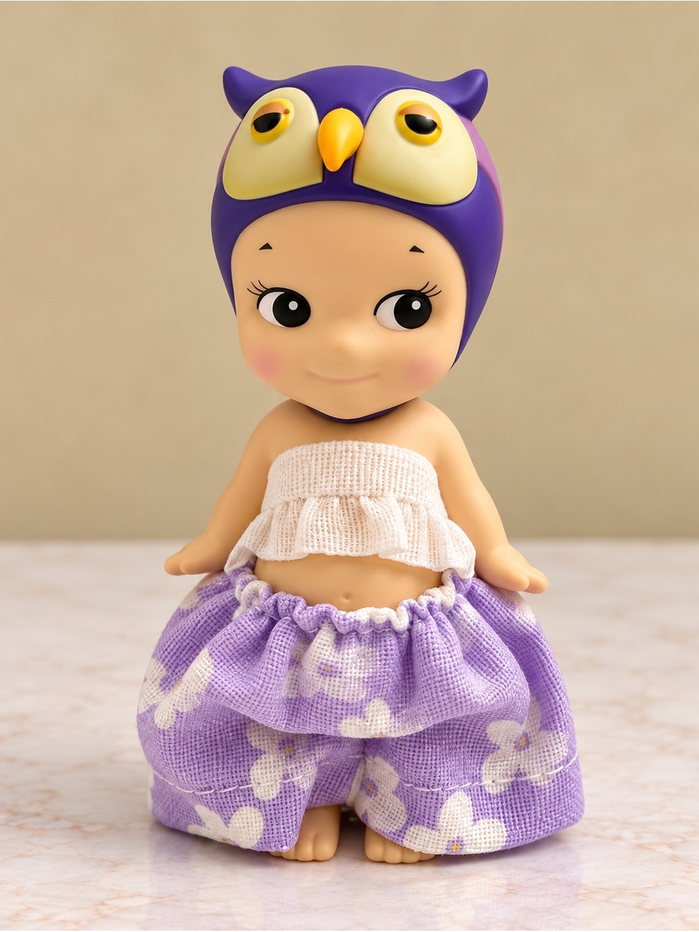 Owl from the Sonny Angel Animal V1 series in purple flowery pants and top!